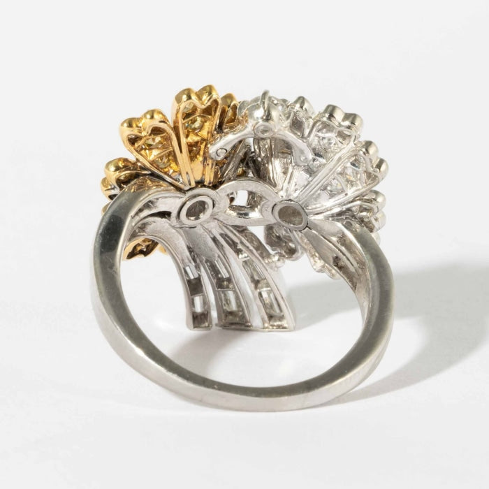 https://mlbxevudnuj9.i.optimole.com/cb:6JVJ.27c76/w:700/h:700/q:mauto/f:best/id:970976ee9882da1fc548b275814ac853/https://shrevecrumpandlow.com/canary-colorless-diamond-vintage-ring-two-tone-10000-20000-jewelry-antique-estate-rings-shreve-crump-low-175.jpg