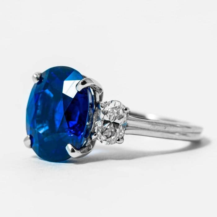 8-38ct-oval-blue-sapphire-3stone-ring-shreve-crump-low-415.jpg