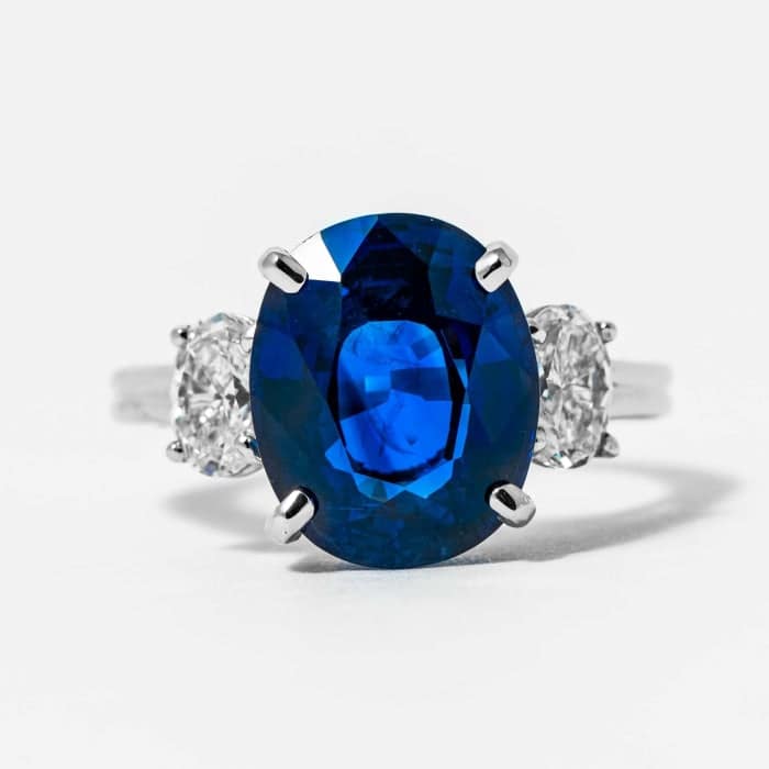 8-38ct-oval-blue-sapphire-3stone-ring-shreve-crump-low-863.jpg