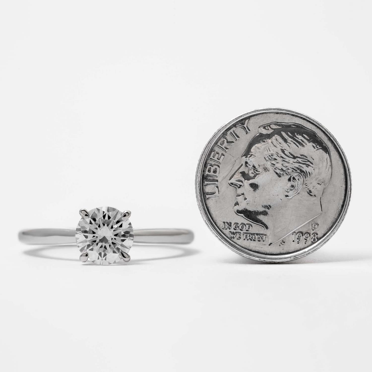 1.05 carat H SI1 Round Brilliant Cut Triple X Diamond Solitaire White